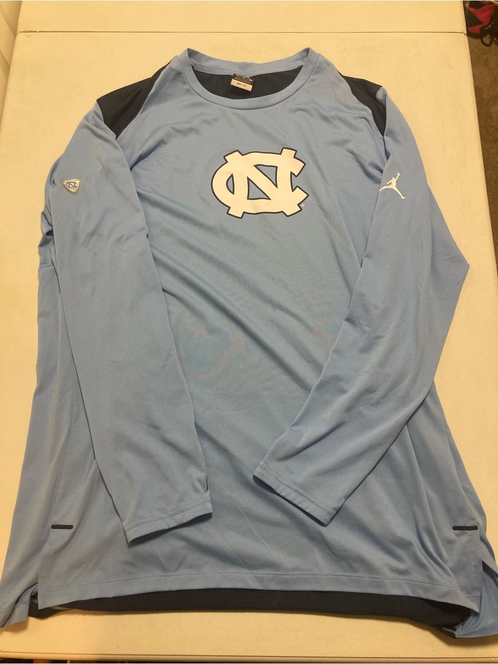 Jordan Men’s Long-Sleeve Carolina Blue UNC Logo Performance Shirt